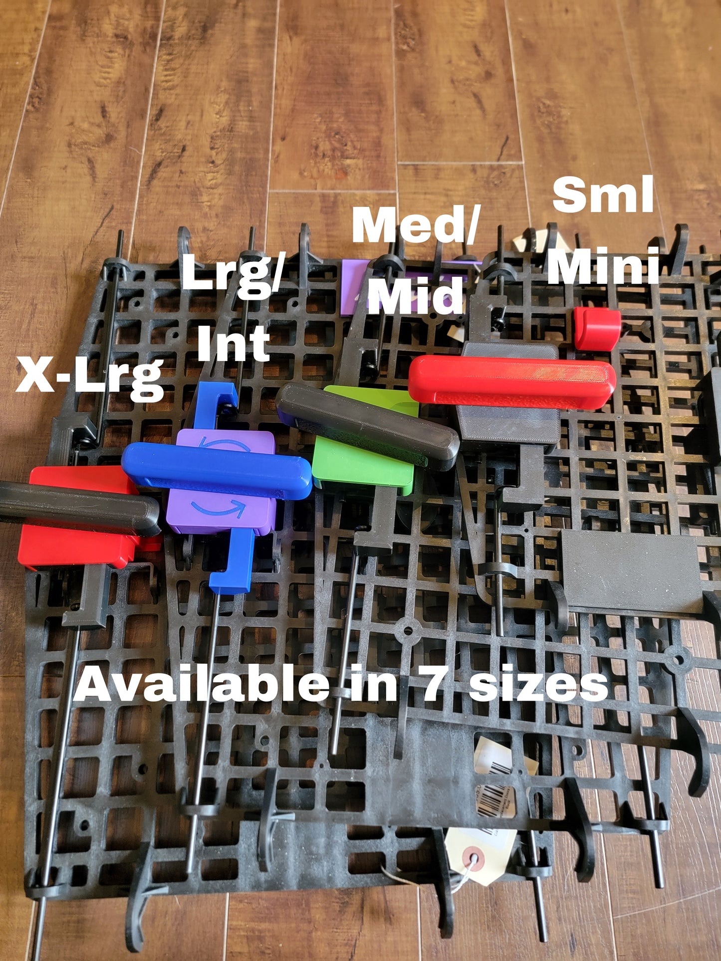 Examples of all the sizes available for turn to open door assist lever. Ruffland Kennel.