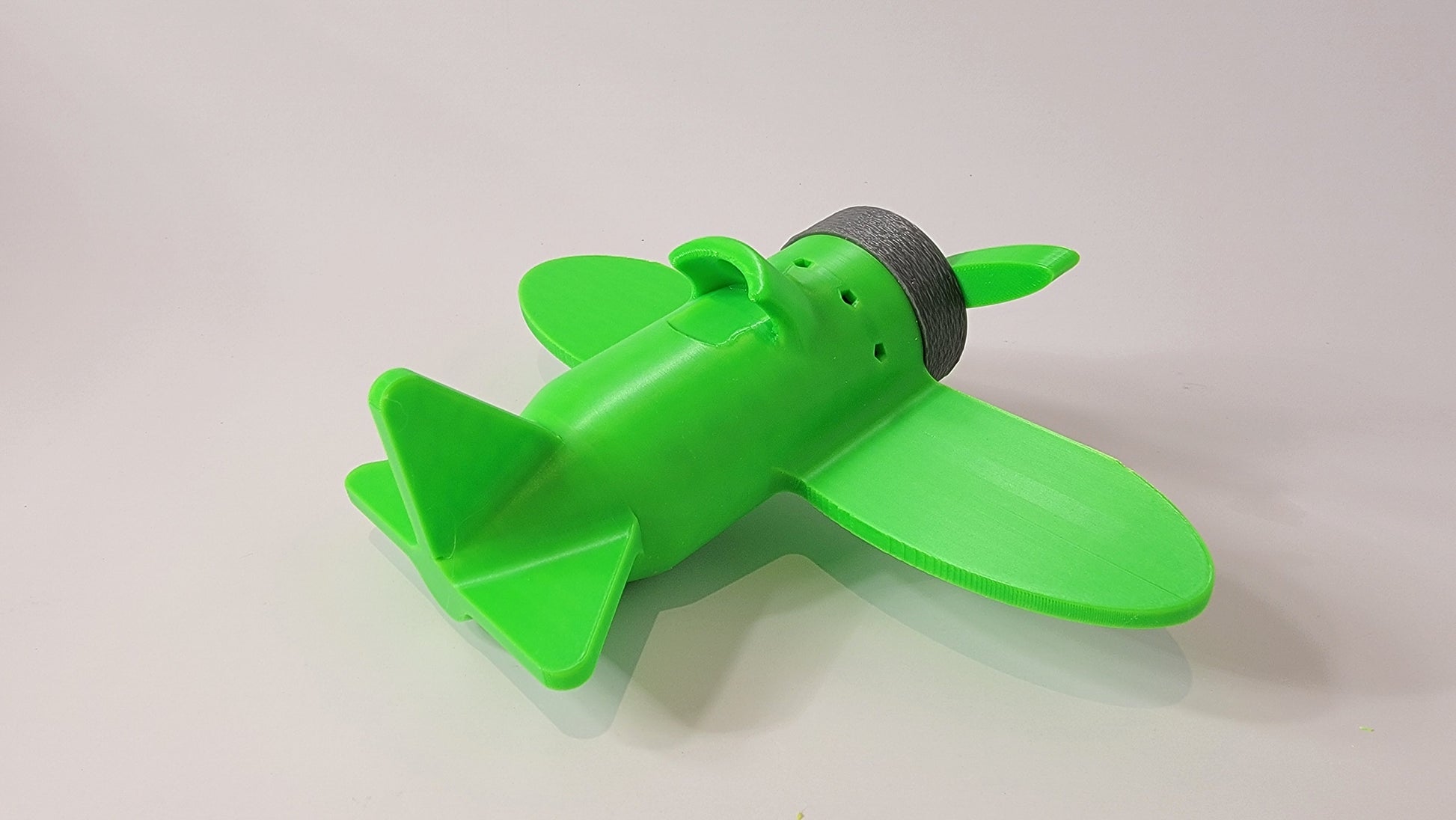 Cartoon airplane scent hide in aerial search position, nose work training equipment