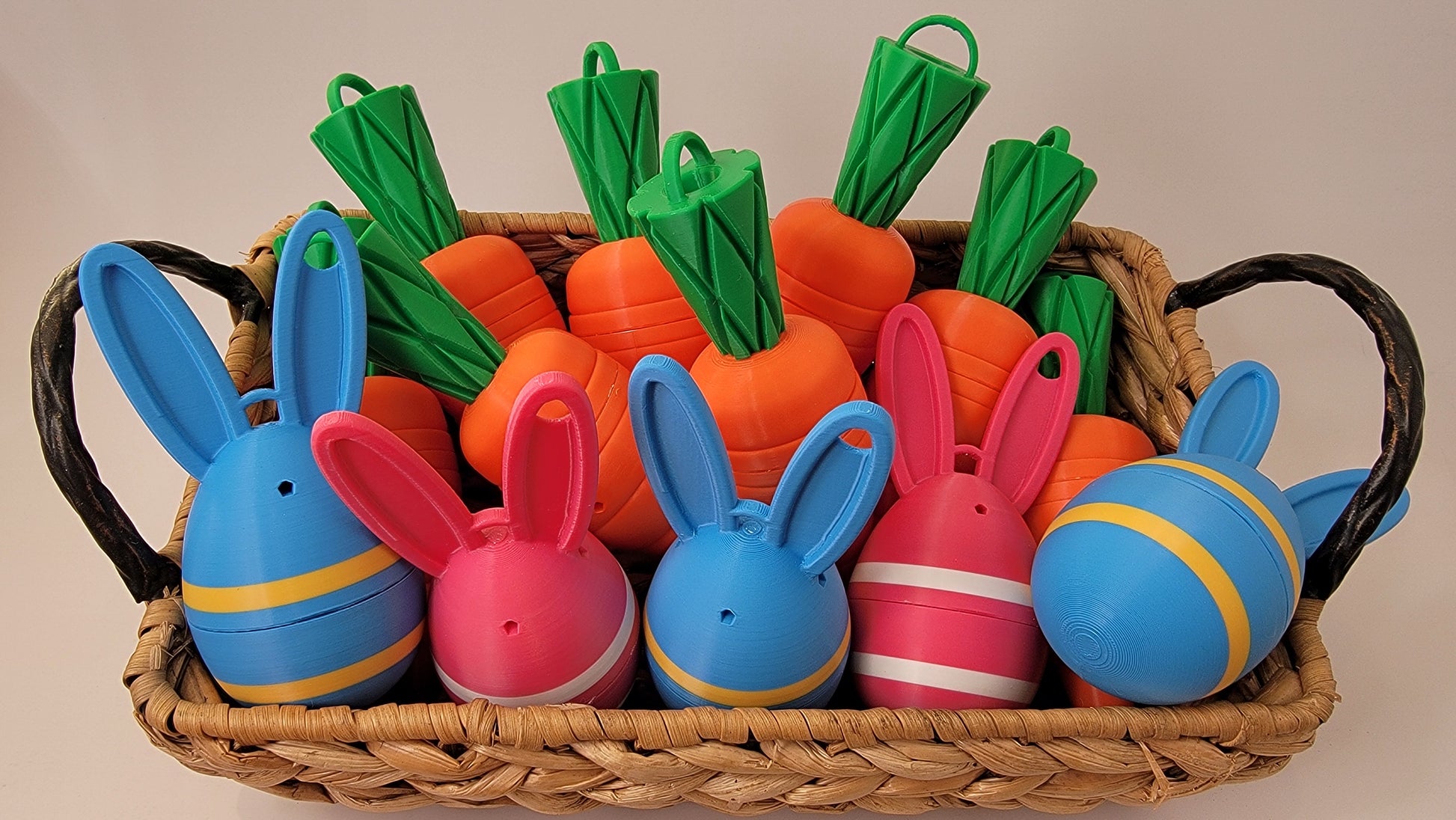 Carrot and Easter egg scent containers used in nose work training and competition