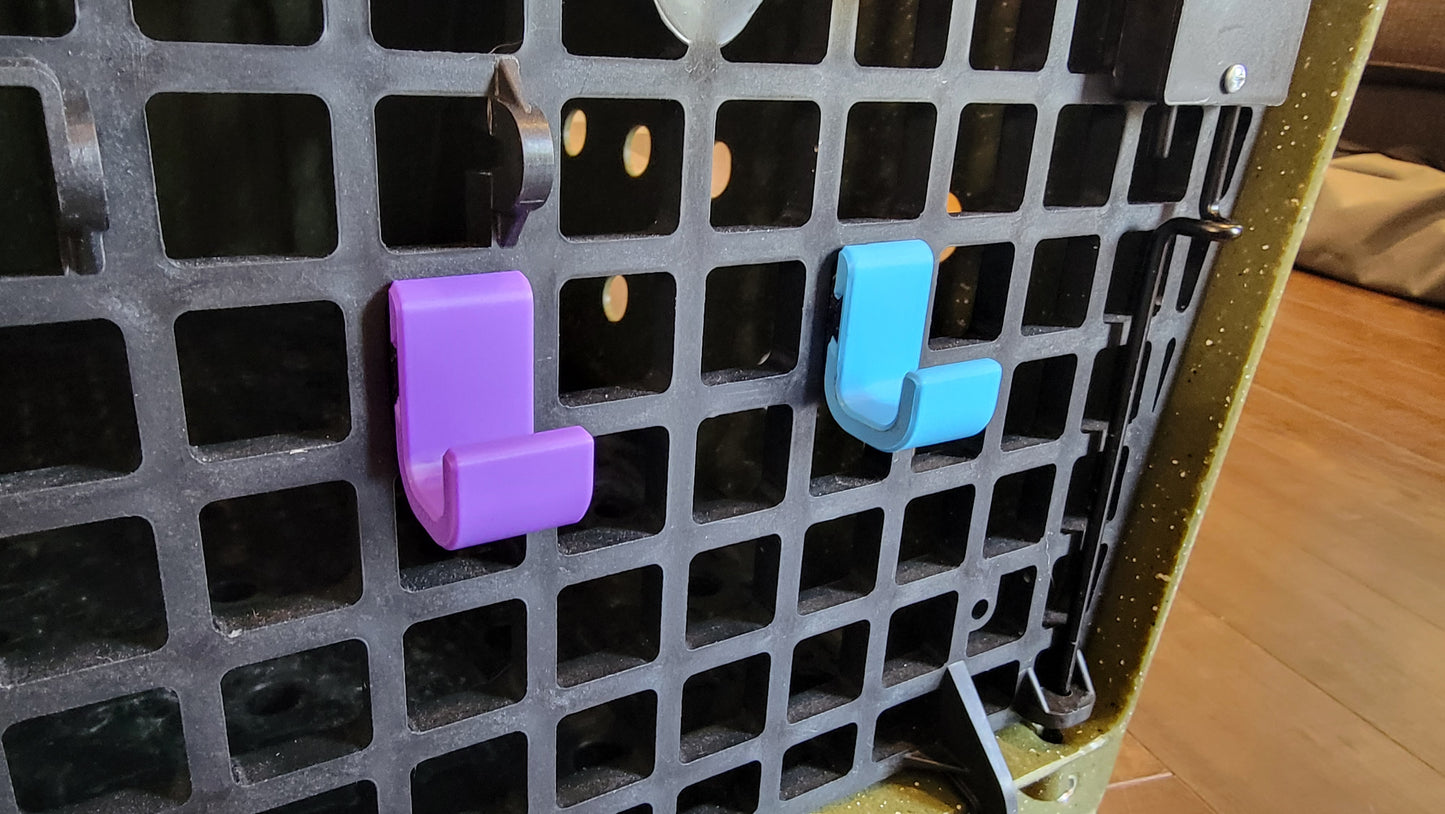 Pair of ABS plastic Ruffland Kennel front hooks. Heat proof. 