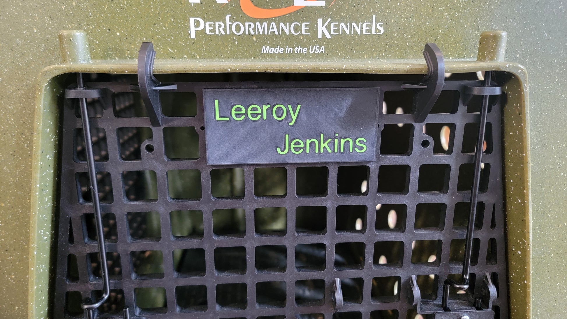 Custom ABS name plate on Ruffland kennel, front view