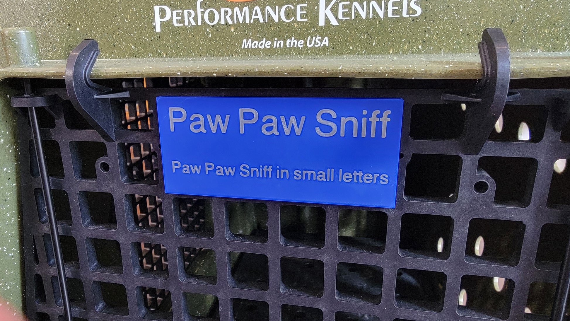 Multi text Ruffland kennel name plate, close-up
